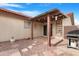 Backyard patio with pergola, grill, and landscaping at 5203 E Saguaro Cir, Phoenix, AZ 85044