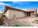 Backyard patio with gravel, brick, and rock landscaping at 5203 E Saguaro Cir, Phoenix, AZ 85044