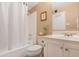 Clean bathroom with white vanity and shower/tub combo at 5203 E Saguaro Cir, Phoenix, AZ 85044