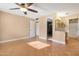 Primary bedroom with tile floors and access to bathroom at 5203 E Saguaro Cir, Phoenix, AZ 85044