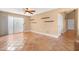 Bright dining area with tile floors and sliding glass door at 5203 E Saguaro Cir, Phoenix, AZ 85044