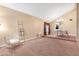 Bright dining room features a chandelier and ample space for a table at 5203 E Saguaro Cir, Phoenix, AZ 85044