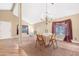 Bright dining area with a chandelier and a table set for four at 5203 E Saguaro Cir, Phoenix, AZ 85044