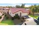 Front view of house with red tile roof and landscaping at 5203 E Saguaro Cir, Phoenix, AZ 85044