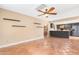 Kitchen features dark cabinetry and a breakfast bar at 5203 E Saguaro Cir, Phoenix, AZ 85044