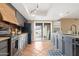 Updated kitchen with granite countertops and stainless steel appliances at 5203 E Saguaro Cir, Phoenix, AZ 85044