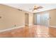 Living room with tile floors and access to patio at 5203 E Saguaro Cir, Phoenix, AZ 85044