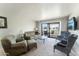 Comfortable living room featuring sliding doors to a patio at 635 S 79Th Pl, Mesa, AZ 85208
