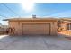 Tan colored detached garage with double doors at 7125 N 25Th Dr, Phoenix, AZ 85051