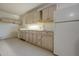 Well-lit kitchenette in garage with wood cabinets at 8717 E Jumping Cholla Dr, Gold Canyon, AZ 85118