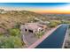 Luxury home with sunset views and desert landscape at 9749 N Fireridge Trl, Fountain Hills, AZ 85268