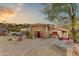 Stunning stone house with a landscaped front yard, walkway, and mountain views at 9749 N Fireridge Trl, Fountain Hills, AZ 85268