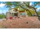 House exterior showcasing stonework and landscaping at 9749 N Fireridge Trl, Fountain Hills, AZ 85268