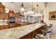 Gourmet kitchen boasts granite counters and island at 9749 N Fireridge Trl, Fountain Hills, AZ 85268
