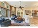 Spacious living room with stone fireplace and comfortable seating at 9749 N Fireridge Trl, Fountain Hills, AZ 85268