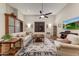 Living room with comfortable seating and large TV at 9749 N Fireridge Trl, Fountain Hills, AZ 85268