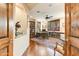Home office with built-in bookshelves and hardwood floors at 9749 N Fireridge Trl, Fountain Hills, AZ 85268