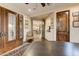 Spacious home office with elegant wood doors and hardwood floors at 9749 N Fireridge Trl, Fountain Hills, AZ 85268