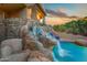 Close up of the waterfall feature next to the pool at 9749 N Fireridge Trl, Fountain Hills, AZ 85268
