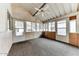 Bright sunroom with ceiling fan and access to outdoors at 17200 W Bell Rd # 1740, Surprise, AZ 85374