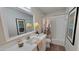 Updated bathroom with a bathtub and modern vanity at 2064 S Farnsworth Dr # 18, Mesa, AZ 85209