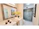Updated bathroom with white vanity, quartz countertop, and glass shower at 2064 S Farnsworth Dr # 18, Mesa, AZ 85209