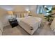 Bright bedroom with a queen-size bed and two nightstands at 2064 S Farnsworth Dr # 18, Mesa, AZ 85209