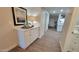 Bright hallway with wood-look flooring and view to living area at 2064 S Farnsworth Dr # 18, Mesa, AZ 85209