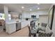 Stylish kitchen with white cabinets and stainless steel appliances at 2064 S Farnsworth Dr # 18, Mesa, AZ 85209