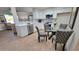 Updated kitchen features white cabinets and quartz countertops at 2064 S Farnsworth Dr # 18, Mesa, AZ 85209