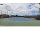 Well-maintained tennis court with green and blue surface at 2064 S Farnsworth Dr # 18, Mesa, AZ 85209