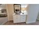 Built-in wet bar with white cabinetry and quartz countertop at 2064 S Farnsworth Dr # 18, Mesa, AZ 85209