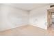 Simple bedroom with tiled floors and window at 2449 W Missouri Ave, Phoenix, AZ 85015