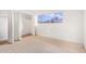 Bedroom with double door closet and window at 2449 W Missouri Ave, Phoenix, AZ 85015