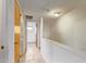 Hallway with access to bedrooms and tiled floors at 2449 W Missouri Ave, Phoenix, AZ 85015