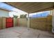 Covered patio with storage shed and gate at 2449 W Missouri Ave, Phoenix, AZ 85015