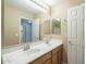 Double sink bathroom with good storage and mirror at 2665 W Goldmine Mountain Dr, San Tan Valley, AZ 85144