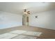 Bright bedroom featuring a ceiling fan and ensuite bathroom access at 2665 W Goldmine Mountain Dr, San Tan Valley, AZ 85144