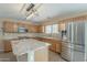 Spacious kitchen with granite countertops and stainless steel appliances at 2665 W Goldmine Mountain Dr, San Tan Valley, AZ 85144