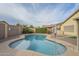 Inviting kidney-shaped pool in a private backyard at 2665 W Goldmine Mountain Dr, San Tan Valley, AZ 85144