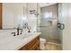 Bathroom with walk-in shower, tiled floors, and modern vanity at 29441 N 64Th St, Cave Creek, AZ 85331