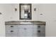 Modern bathroom with granite countertop, updated vanity, and stylish mirror at 29441 N 64Th St, Cave Creek, AZ 85331