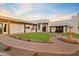 Elegant courtyard featuring a fountain and lush landscaping at 29441 N 64Th St, Cave Creek, AZ 85331