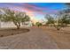 Brick paver driveway leading to a beautiful Southwestern home at 29441 N 64Th St, Cave Creek, AZ 85331