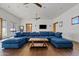 Game room featuring sectional sofa and hardwood floors at 29441 N 64Th St, Cave Creek, AZ 85331