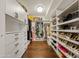 Large walk-in closet with ample shelving and hanging space at 29441 N 64Th St, Cave Creek, AZ 85331