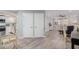 Open concept living and dining area with wood-look floors at 4200 N Miller Rd # 309, Scottsdale, AZ 85251