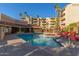 Relaxing community pool and spa with plenty of comfortable seating at 4200 N Miller Rd # 309, Scottsdale, AZ 85251