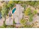 Aerial view showcasing the home, pool, and expansive backyard at 4531 E Quartz Mountain Rd, Paradise Valley, AZ 85253