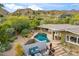 Stunning property showcasing a large pool, patio, and hillside views at 4531 E Quartz Mountain Rd, Paradise Valley, AZ 85253